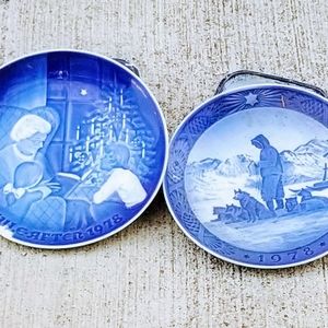 Two hand painted plates
